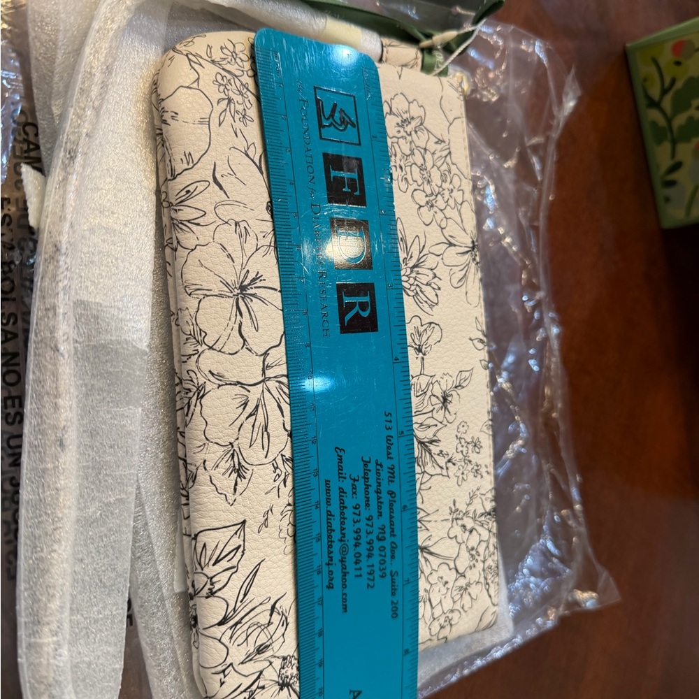 Vera Bradley Cream and Black Floral Knotted Wristlet